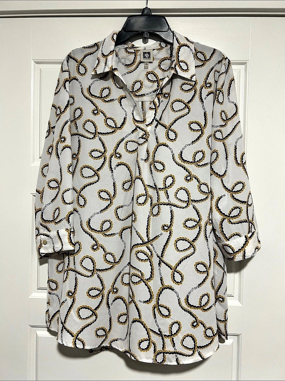 Anne Klein Abstract Print V-Neck blouse. White base with yellow and navy ro